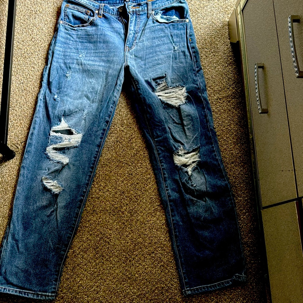 Distressed denim jeans